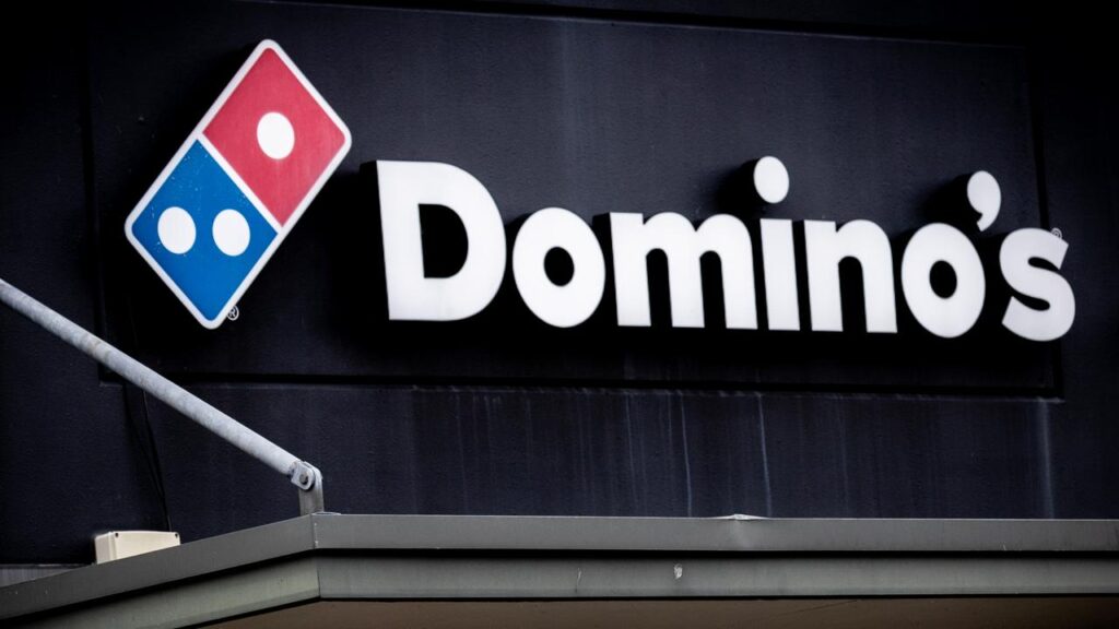 signs-in-domino’s-store-spark-outrage